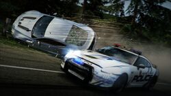 Nissan GT-R Takedown Aston Martin V12 Vantage NFS Hot Pursuit 2010.jpg