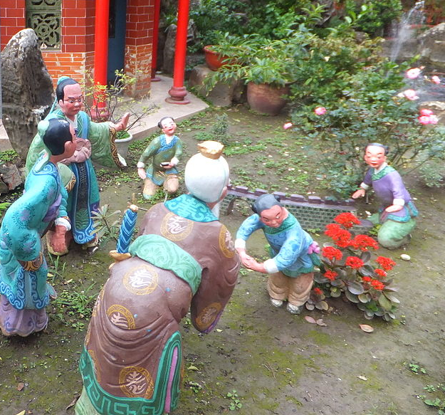 「仲尼师项橐」（台湾台南市麻豆代天府水泥像）（图片：Outlookxp/维基，CC BY-SA 4.0，局部）