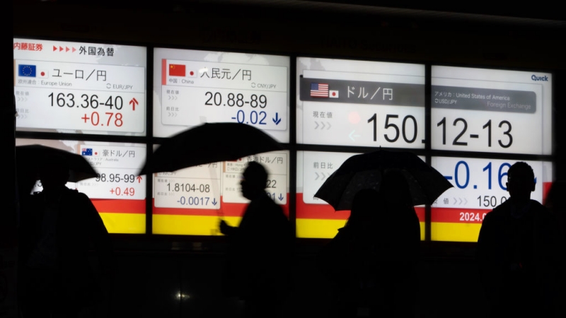 一幅显示汇率走势的电子看板。（Getty Images）