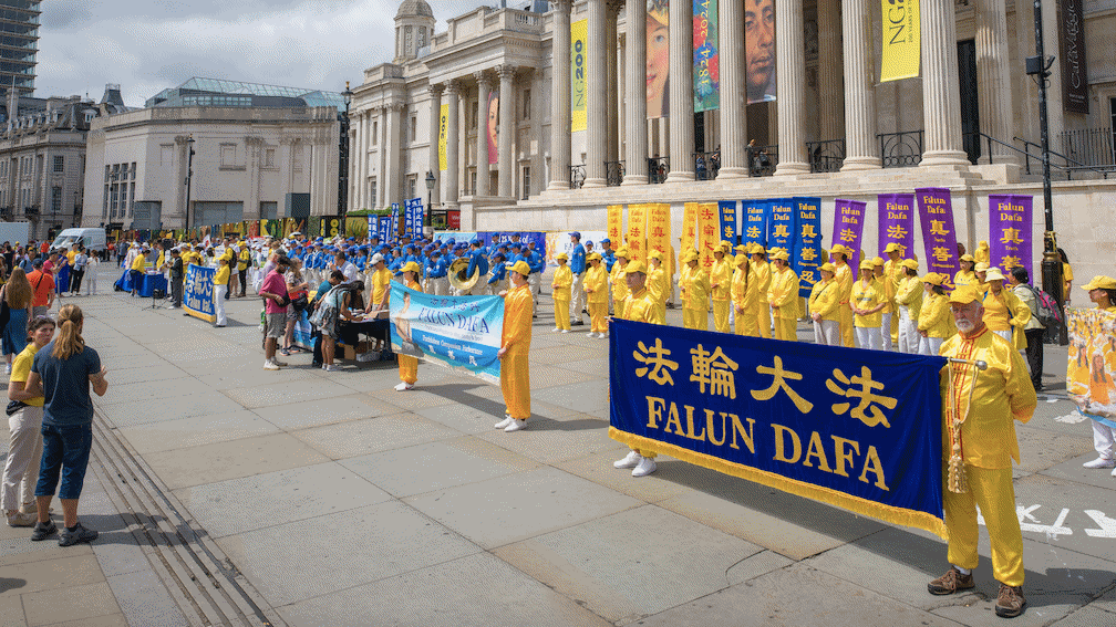 7月20日，英国法轮功学员在伦敦举行游行集会活动，向民众展示法轮大法的美好，并揭露中共对法轮功的残酷迫害及活摘人体器官的罪恶。（图片来源：晏宁/英国）