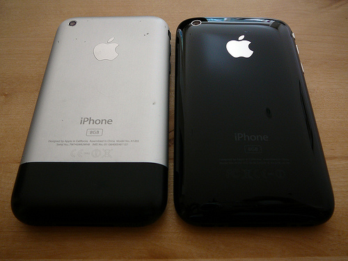 The original iPhone, next to an iPhone 3G compared in 2008, both popular smartphones of the late 2000's.