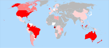 World map showing countries in gray, white and in various shades of red. The U.S. and Australia stand out as bright red (which the caption identifies as the 60–80 % color). Brazil and Canada are medium pink (40–60 %). China, much of western Europe, and central Africa are light pink (1–20 %). Germany, Japan, Nigeria, and Venezuela are white (<1 %).