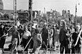 Paramilitary police with workers, Riga, 11 July 1941 (Wehrmacht photo)