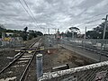 The pedestrian crossing gates, adjacent to the station on the northern side, October 2024