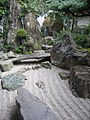 Japanese rock garden, A mountain, waterfall, and gravel "river" at Daisen-in (1509–1513)