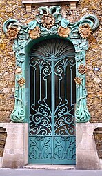 Polychrome glazed ceramic façade ornaments – Avenue Gallieni no. 14 in Paris, by Eugène Coulon (1903–04)