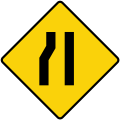 Road narrows on left side