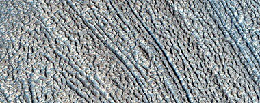 Close, color view of lineated valley fill, as seen by HiRISE under HiWish program