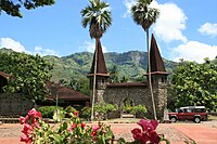 Two identical church towers with pointed spires