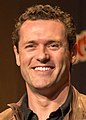 Jason O'Mara interpreta Jim Shannon