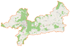 Mapa konturowa powiatu pilskiego, blisko centrum na dole znajduje się punkt z opisem „Kaczory”