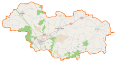 Mapa konturowa powiatu rawickiego, w centrum znajduje się punkt z opisem „Sarnowa”