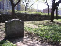 Tombstone in a grassy lawn