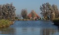 Boerderij in de polder bij Krommeniedijk