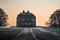 The Hermitage Lodge seen from west at sunrise in January