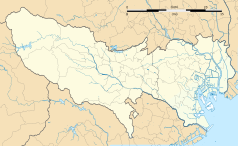 Mapa konturowa prefektury Tokio, po prawej nieco na dole znajduje się punkt z opisem „Ariake Coliseum”