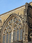 On the front of Abbatial church of Saint-Antoine-l'Abbaye with 2 groups of 2 triskelions and 1 biskel (in Isère / France)