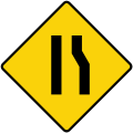 Road narrows on right side