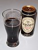 Can of Guinness Original, plus the beer in a glass