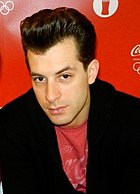 Mark Ronson looking towards the camera.