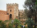 The walls and one of the towers surrounding the gardens