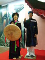 Nón quai thao with traditional male and female dresses for Quan họ.