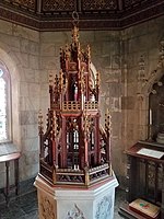 Detail of carved baptismal font cover