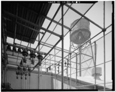 Water tower and electrical transformer cage