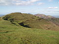 Photo of the British Camp hill showing its terraced Iron Age earthworks (from History of Worcestershire)