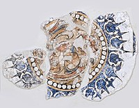 Kara-Khanid medallion with fighting birds, Afrasiab, circa 1200 CE.[82]