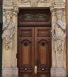 Termes de Minerve et Mercure (1863), façade du 38, rue du Président-Édouard-Herriot à Lyon.