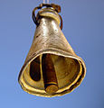 Improvised cowbell for sheep or goats, found in 1988 near Tuqu', the West Bank. The aluminium bell's body is probably a broken kitchen utensil, while the clapper is a brass cartridge case (SMI 25 NATO, probably 7.62×51mm).