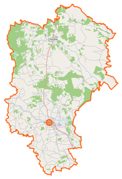 Mapa konturowa powiatu przasnyskiego, u góry znajduje się punkt z opisem „Chorzele”