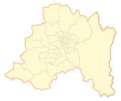 Mapa konturowa Regionu Metropolitalnego, w centrum znajduje się punkt z opisem „Puente Alto”