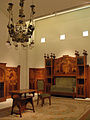 Main Floor Saloon by Gaspar Homar, conserved at Museu Nacional d'Art de Catalunya.