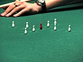 Ensemble de neuf quilles utilisées dans une variante du billard italien.