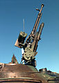 DShKM anti-aircraft machine gun on a T-55 tank loader's roof hatch