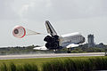 Endeavour deploys its drag chute to aid deceleration.