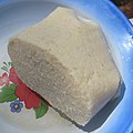 Garri to eat by hand with fish and greens. Ndop, Northwest Cameroon, 2011