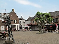 Renkum town streetview with church tower in the background