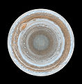 Image 1 Polar map of Jupiter Photo credit: Cassini orbiter This polar map of Jupiter, taken by the Cassini orbiter as it neared Jupiter during a flyby on its way to Saturn, is the most detailed global color map of the planet ever produced. The south pole is in the center of the map and the equator is at the edge. The map shows a variety of colorful cloud features, including parallel reddish-brown and white bands, the Great Red Spot, multi-lobed chaotic regions, white ovals, and many small vortexes. Many clouds appear in streaks and waves due to continual stretching and folding by Jupiter's winds and turbulence. More selected pictures