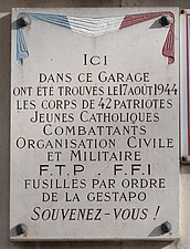 Plaque au no 65.