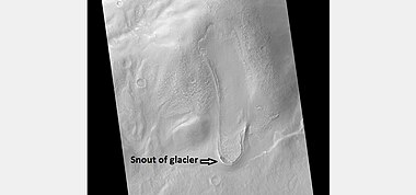 Tongue-shaped glacier, as seen by HiRISE under the HiWish program. Ice may exist in the glacier, even today, beneath an insulating layer of dirt. Location is Hellas quadrangle.