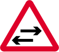 Two-way traffic across a one-way road ahead