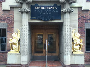 Merchants National Bank entrance with gold winged lions, Grinnell, IA