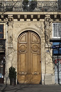 Neoclassical caryatids of Quai de la Mégisserie no. 14, Paris, sculptor Auguste Millet and architect Henri Blondel, 1864[28]