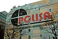 Reklama Polisy SA przy ul. Siennej 45 w Warszawie