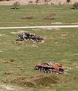 Des carcasses de Chieftains servant de cibles au polygone de tir de Lulworth Ranges.