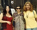 Activists Kenny de Michellis (left), María Belén Correa (right) and the lawyer for their groups (center) at the Casa Rosada in 1994, asking to have a hearing with the President