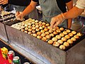 Memasak takoyaki